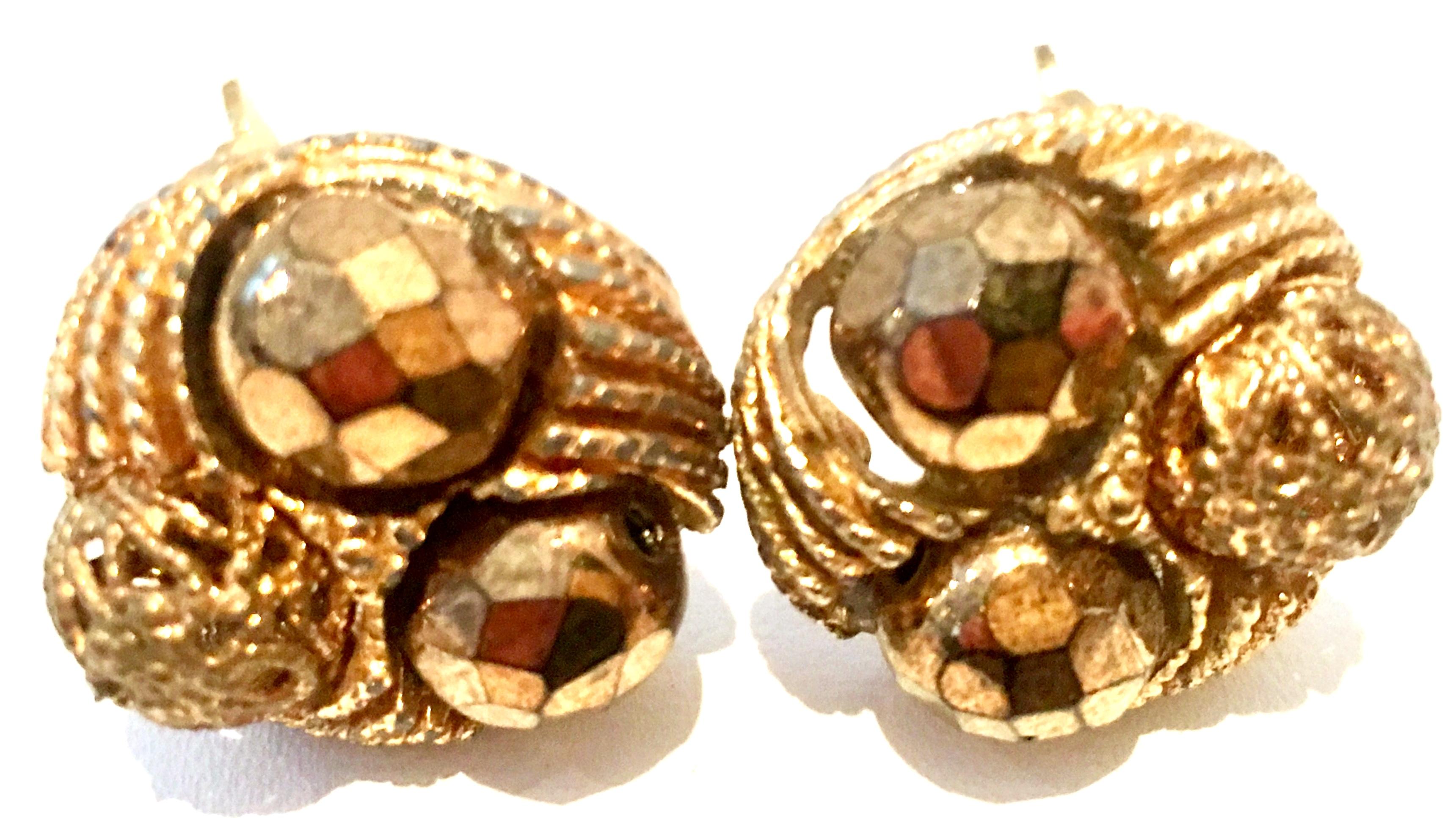 Mid-20th Century Gold Plate Beaded Earrings. These clip style gold plate earrings feature brilliant cut and faceted mirrored round bead detail.
see our listing for the matching necklace item #LU75738004432