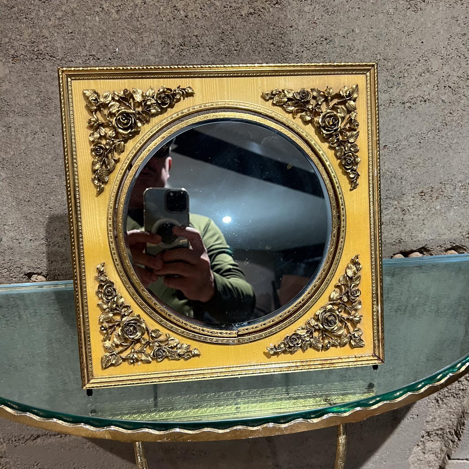 Antique Vintage Table Vanity Mirror French Ornamentation 
Double sided mirror; flat and convex mirror.
No label present. In the style of Fred K. Loeser & Co
11.25 x 11.25 x 1 thick x 9.5 d adjustable
Good original vintage preowned condition.
Review