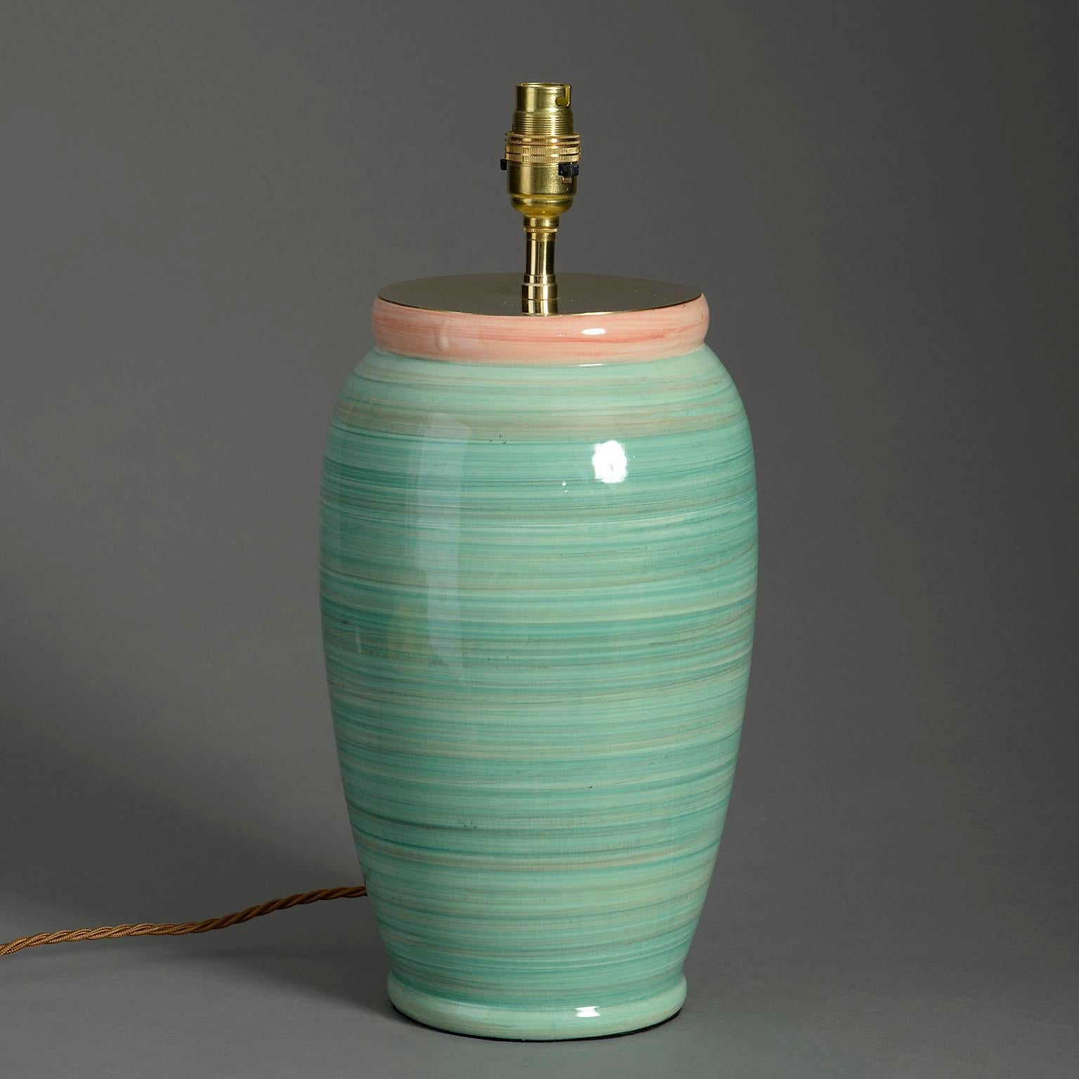 A mid-20th century green glazed pottery vase of good scale, now mounted as a table lamp.

Dimensions refer to ceramic elements only.

Display shade not included.