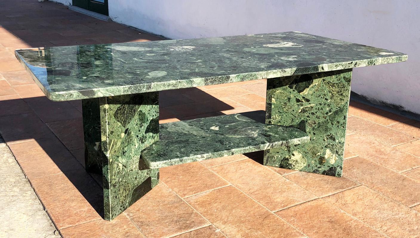 Green marble from the alps smoking table.
The table is original from the 1950s, it can be disassembled into four pieces and easily transported.
The table is particularly elegant.
The thickness of the marble is 3/4 inches.