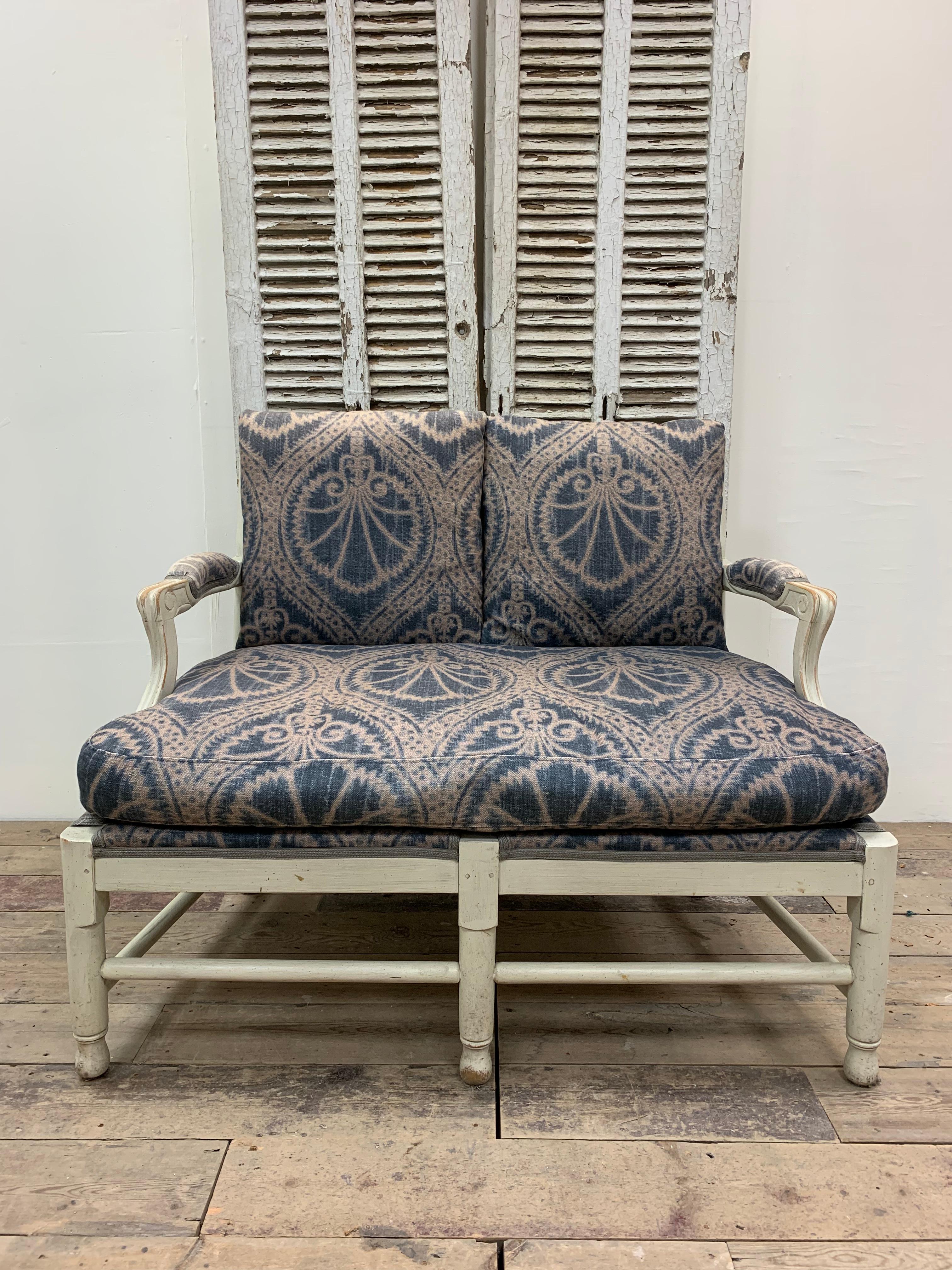 This famous Gripsholm model was originally designed in the late 1800s with this version dating to around the 1950s.  
A very sturdy and classic design with its traditional ladder-back.  The sofa has four loose upholstered cushions that can be