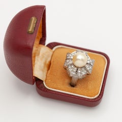 Mid-20th Century Gübelin Platinum Diamond Pearl Hidden Watch Ring