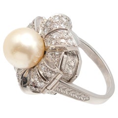 Mid-20th Century Gübelin Platinum Diamond Pearl Hidden Watch Ring