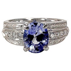 Vintage Mid-20th Century Hand Engraved Platinum, Sapphire, and Diamond Cocktail Ring