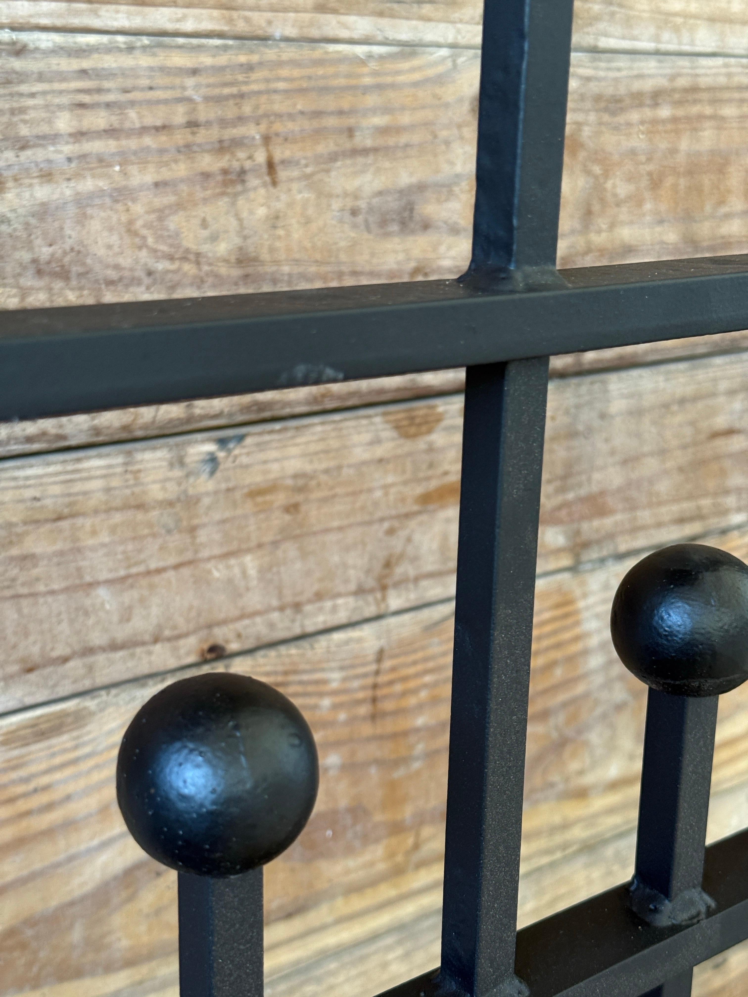 Slightly different but equally fabulous, this single vintage window grille features the same bold curves and scrolled base, but with a simplified straight-top silhouette. A statement piece on its own or a great addition for asymmetrical layouts.
•
