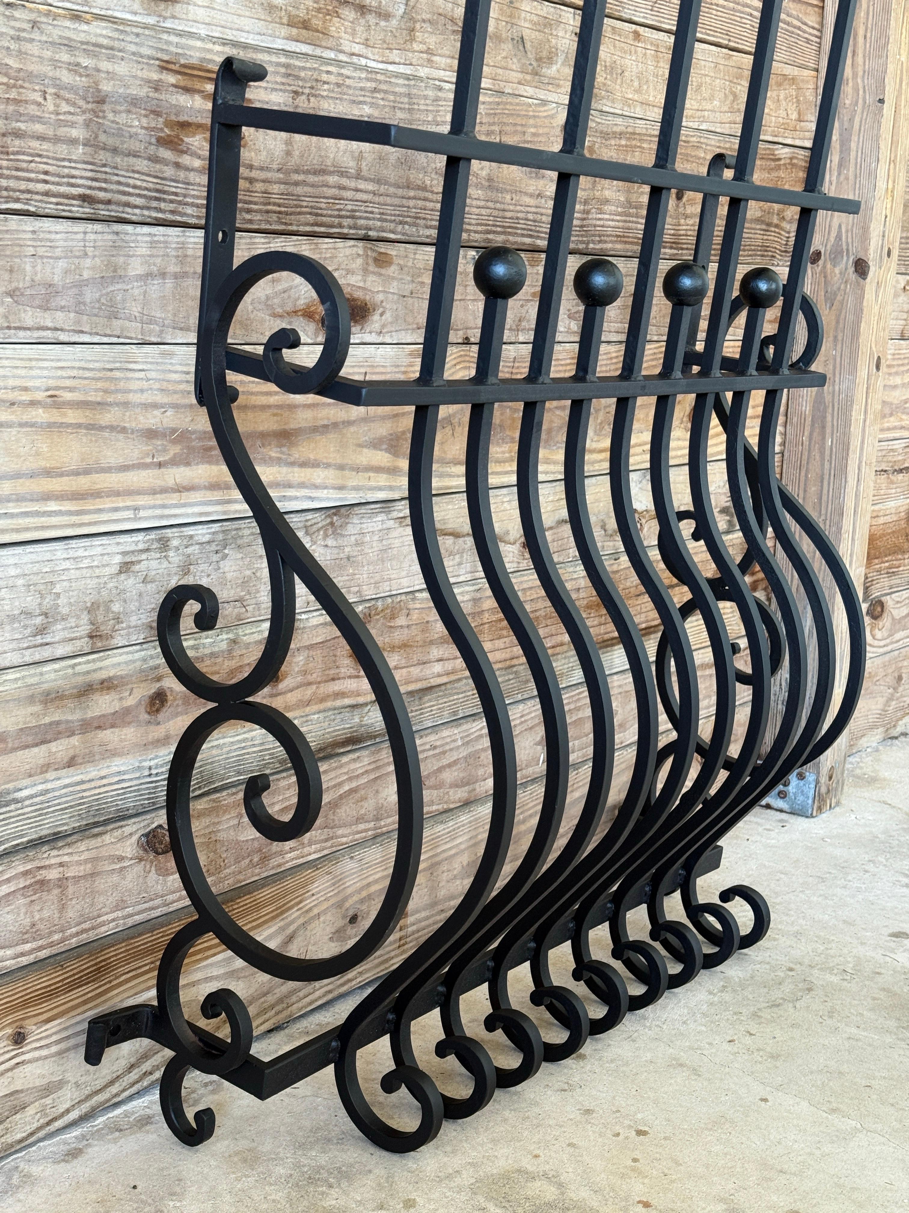Wrought Iron Mid-20th Century Hand-Forged Iron Window Grilles With Sculptural Scrollwork-Pair For Sale
