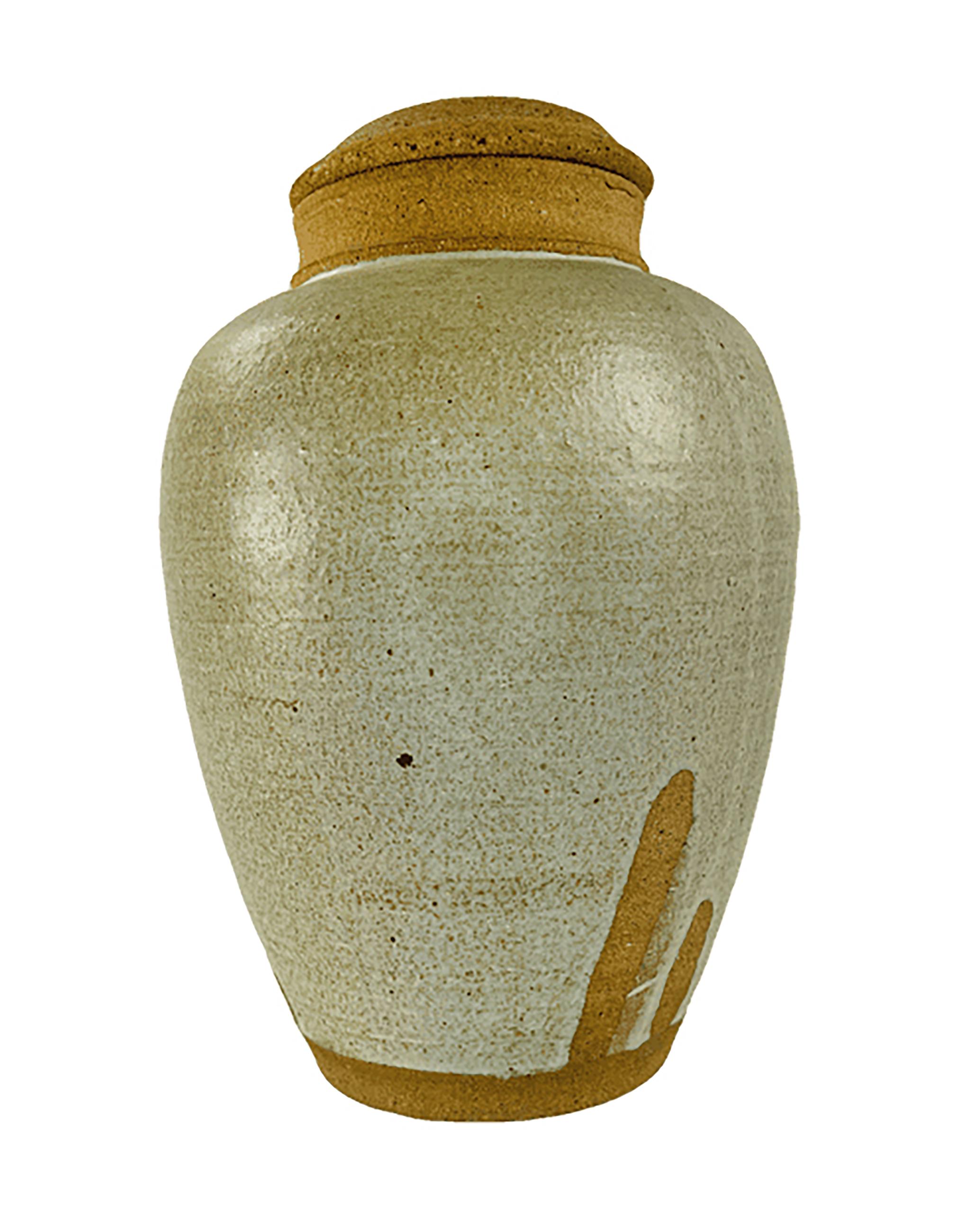 Glazed Mid 20th century hand turned clay lidded jar with a lava glazed finish For Sale