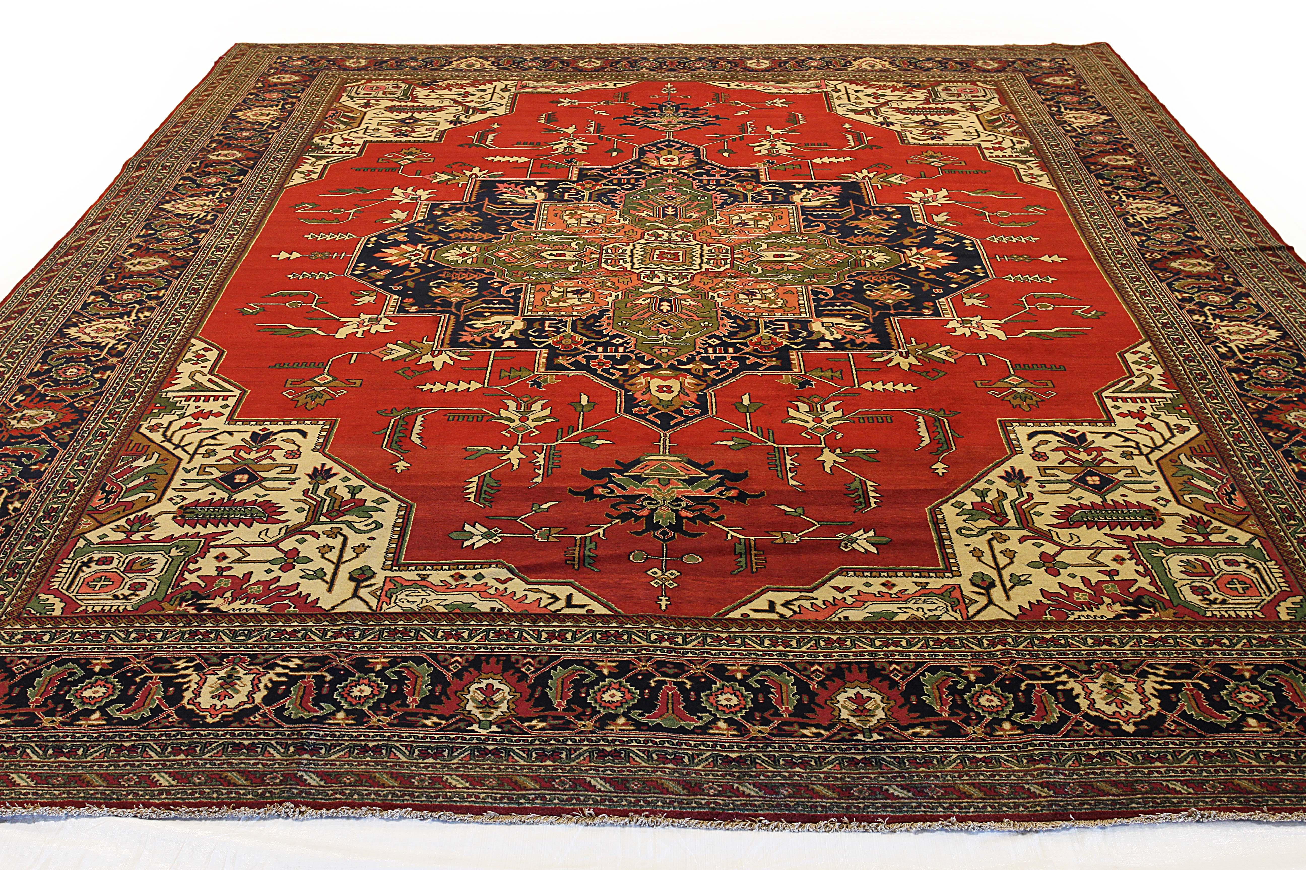 Mid-20th century hand-woven Persian area rug made from fine wool and all-natural vegetable dyes that are safe for people and pets. It features traditional Tabriz weaving depicting intricate botanical and animal patterns often in bold colors.