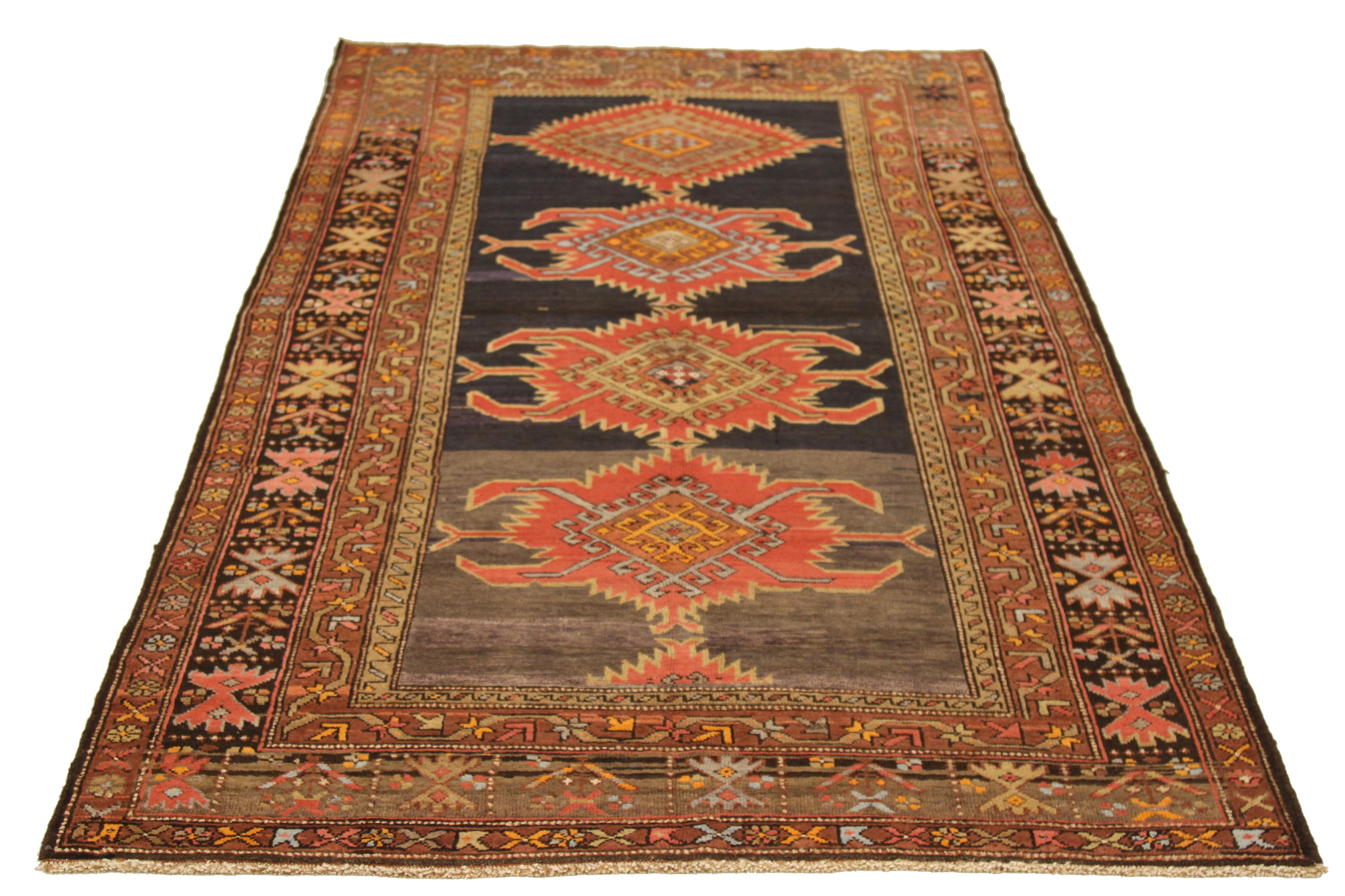 Mid-20th century hand-woven Russian area rug made from fine wool and all-natural vegetable dyes that are safe for people and pets. This beautiful piece features ornate tribal patterns which Kazak rugs are known for. 

This area rug has dimensions