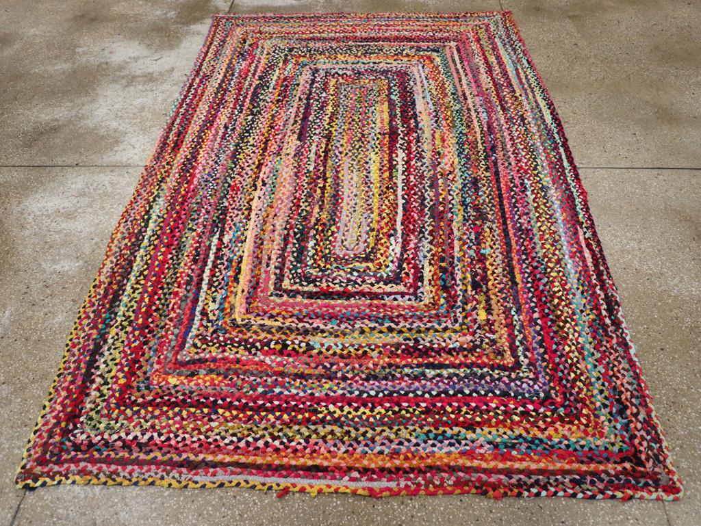 A vintage American Braided accent rug handmade during the mid-20th century.

Measures: 5' 3
