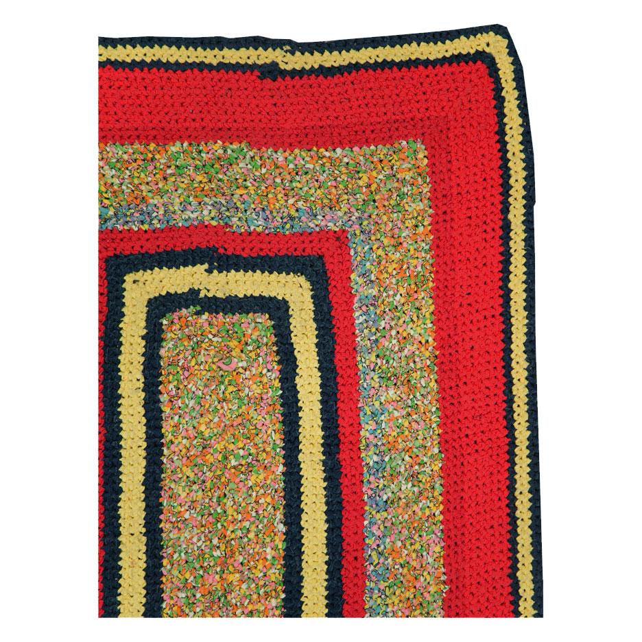 A vintage American Rag rug in throw/scatter size handmade during the mid-20th century.

Measures: 3' 3