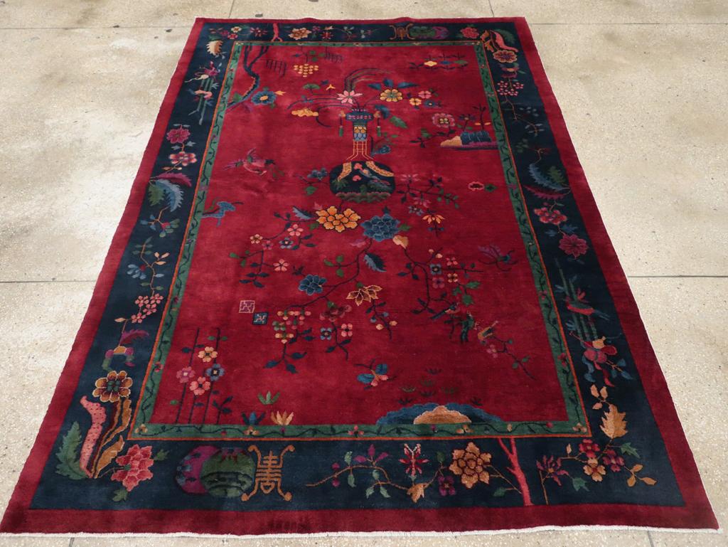 A vintage Chinese Art Deco accent carpet handmade during the mid-20th century.

Measures: 6' 0