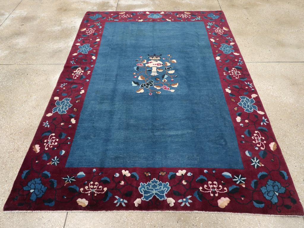 A vintage Chinese Art Deco accent rug handmade during the mid-20th century.

Measures: 6' 2