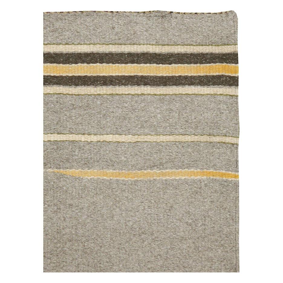 A vintage European flat-weave Kilim throw rug handmade in Poland during the mid-20th century.

Measures: 3' 5