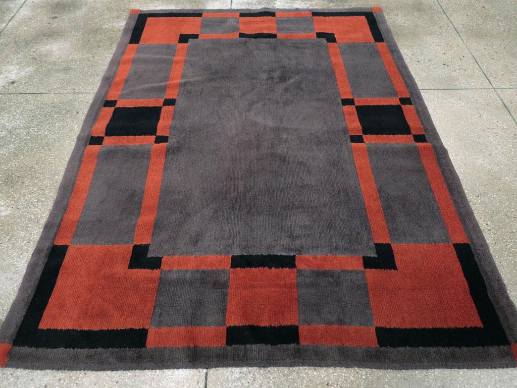 A vintage French Art Deco accent rug handmade during the mid-20th century.

Measures: 5' 8