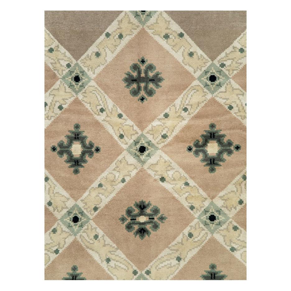 A vintage French Moderne accent carpet handmade during the mid-20th century and designed by Leleu.