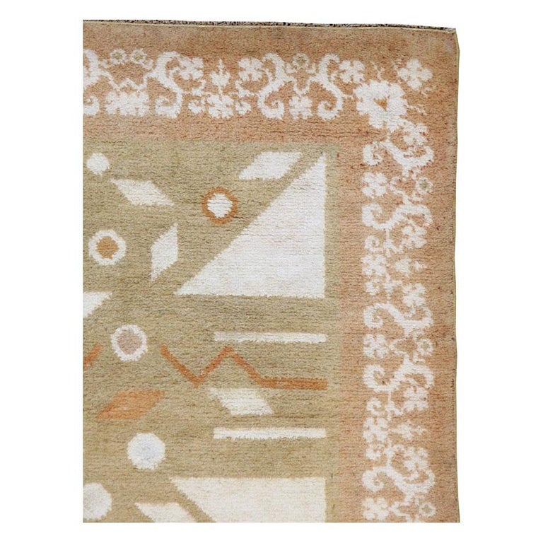 A vintage Cotton Agra accent rug handmade during the mid-20th century.

Measures: 3' 10