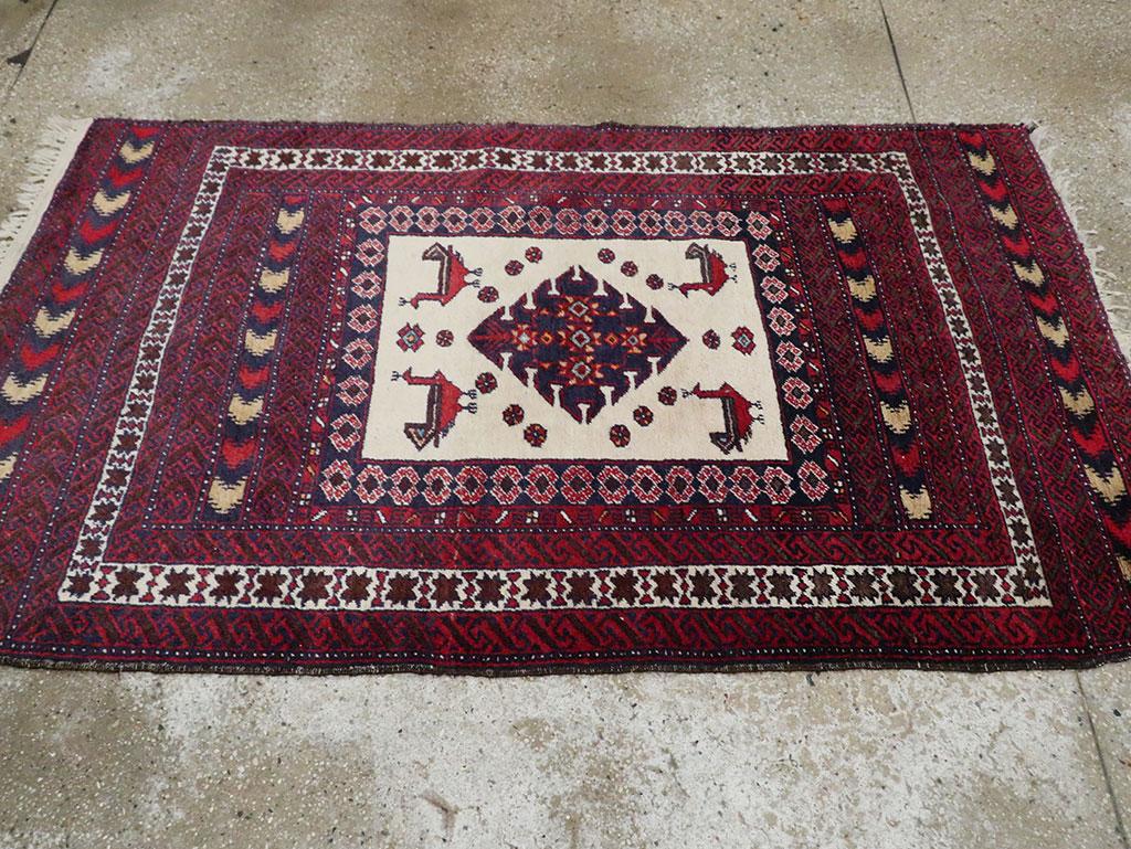 Mid-20th Century Handmade Persian Baluch Throw Rug In Excellent Condition For Sale In New York, NY