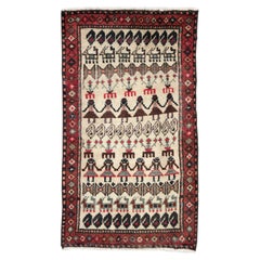 Tapis persan Baluch fait à la main au milieu du 20e siècle