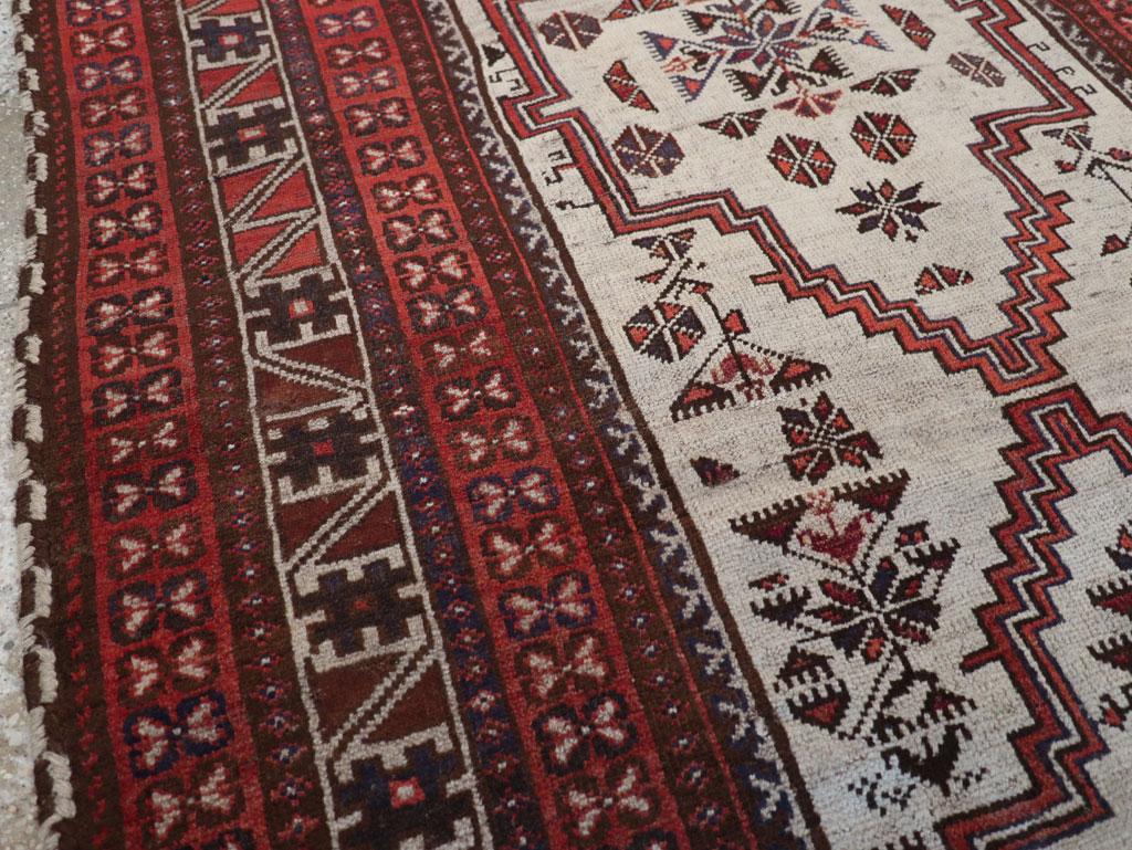 Hand-Knotted Mid-20th Century Handmade Persian Baluch Tribal Accent Rug For Sale