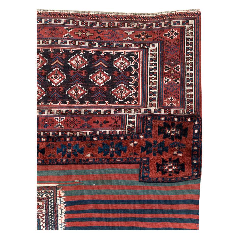 A vintage Persian flatweave Kilim square throw rug handmade during the mid-20th century.

Measures: 3' 5
