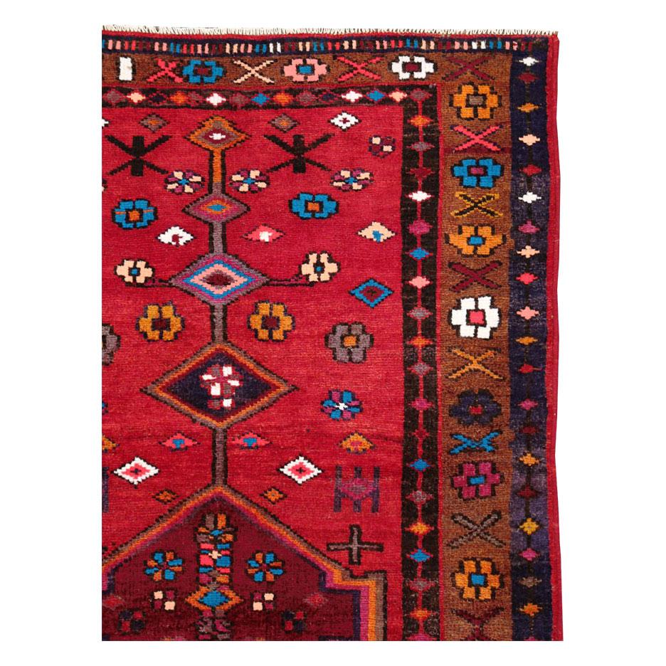 A vintage Persian Hamadan accent rug handmade during the mid-20th century.

Measures: 3' 5
