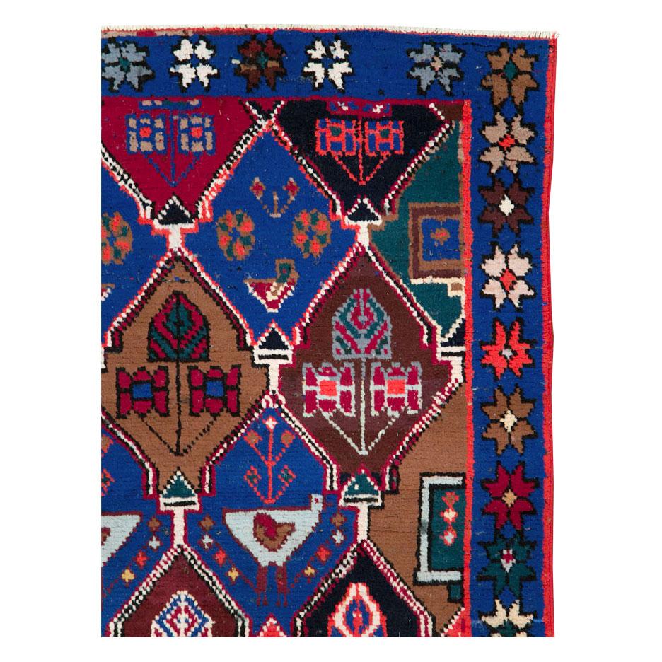 A vintage Persian Hamadan accent rug handmade during the mid-20th century with cotton highlights.

Measures: 3' 11