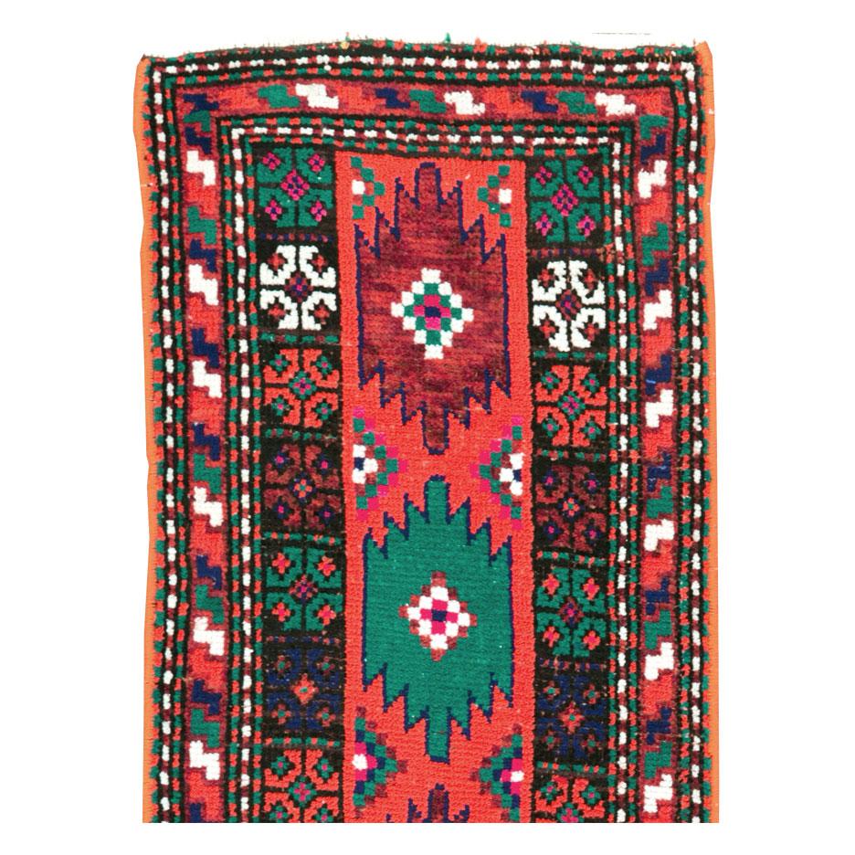 A vintage Persian Hamadan runner handmade during the mid-20th century with cotton highlights.

Measures: 1' 3