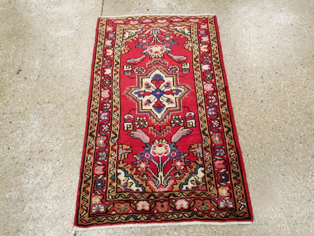 A vintage Persian Hamadan throw rug handmade during the mid-20th century.

Measures: 2' 0