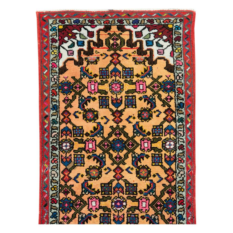A vintage Persian Hamadan throw rug handmade during the mid-20th century.

Measures: 1' 9