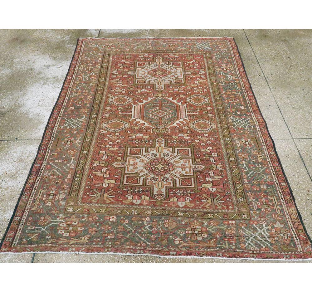 A vintage Persian Karajeh accent rug handmade during the Mid-20th Century.

Measures: 4' 10