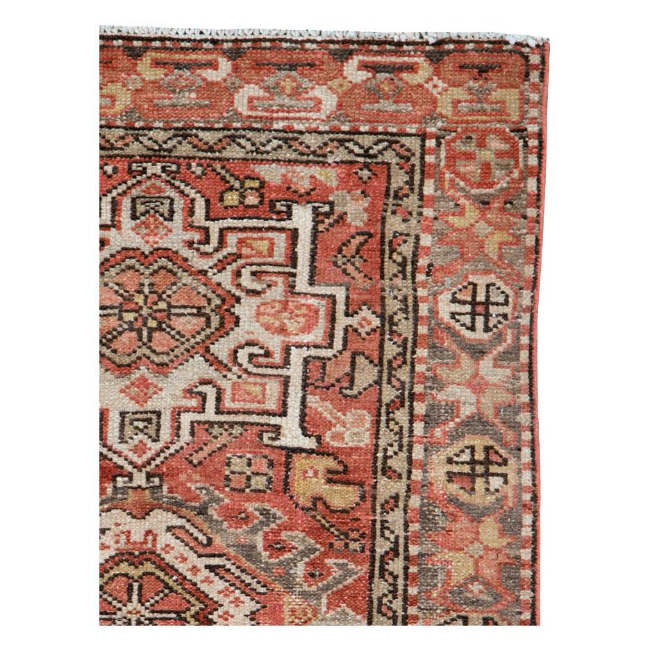 A vintage Persian Karajeh throw rug handmade during the mid-20th century.

Measures: 2' 9