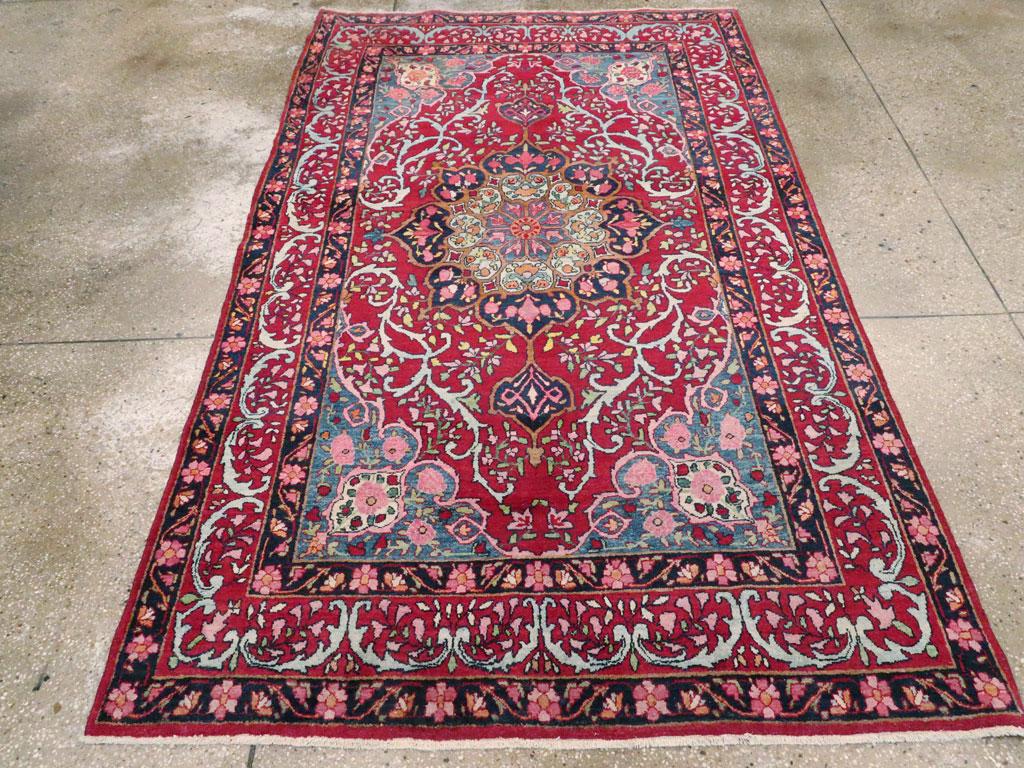 A vintage Persian Lavar Kerman accent rug handmade during the mid-20th century.

Measures: 4' 7