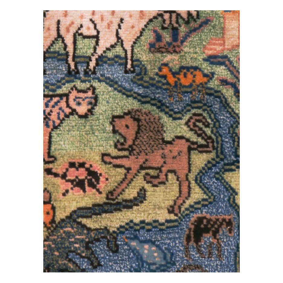 A vintage Persian Mahal accent rug in runner format handmade during the mid-20th century with a pictorial design.

Measures: 3' 6