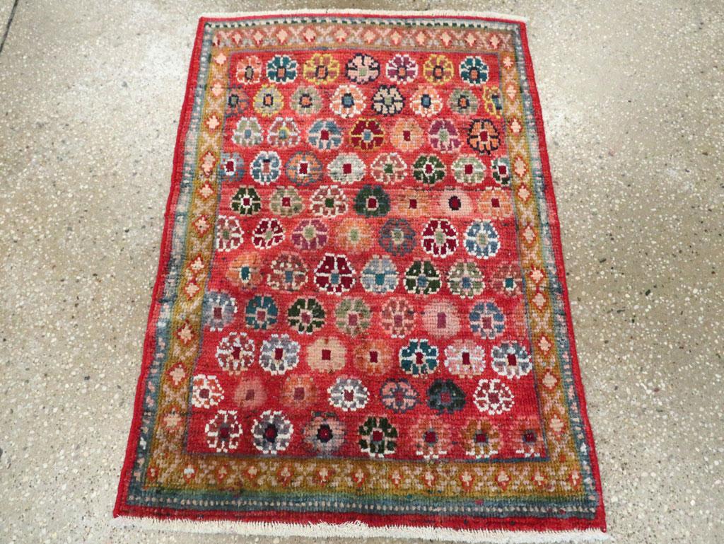 A vintage Persian Mahal small throw rug handmade during the mid-20th century.

Measures: 2' 0