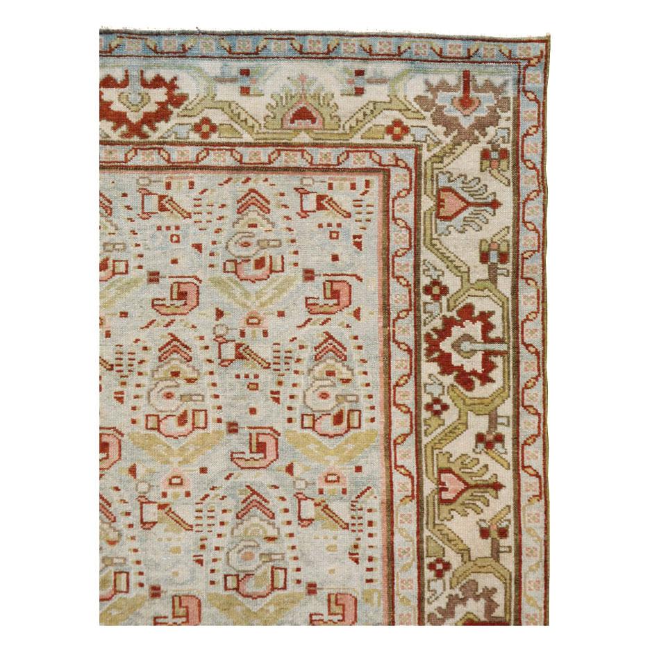 A vintage Persian Malayer accent rug handmade during the mid-20th century.

Measures: 4' 5