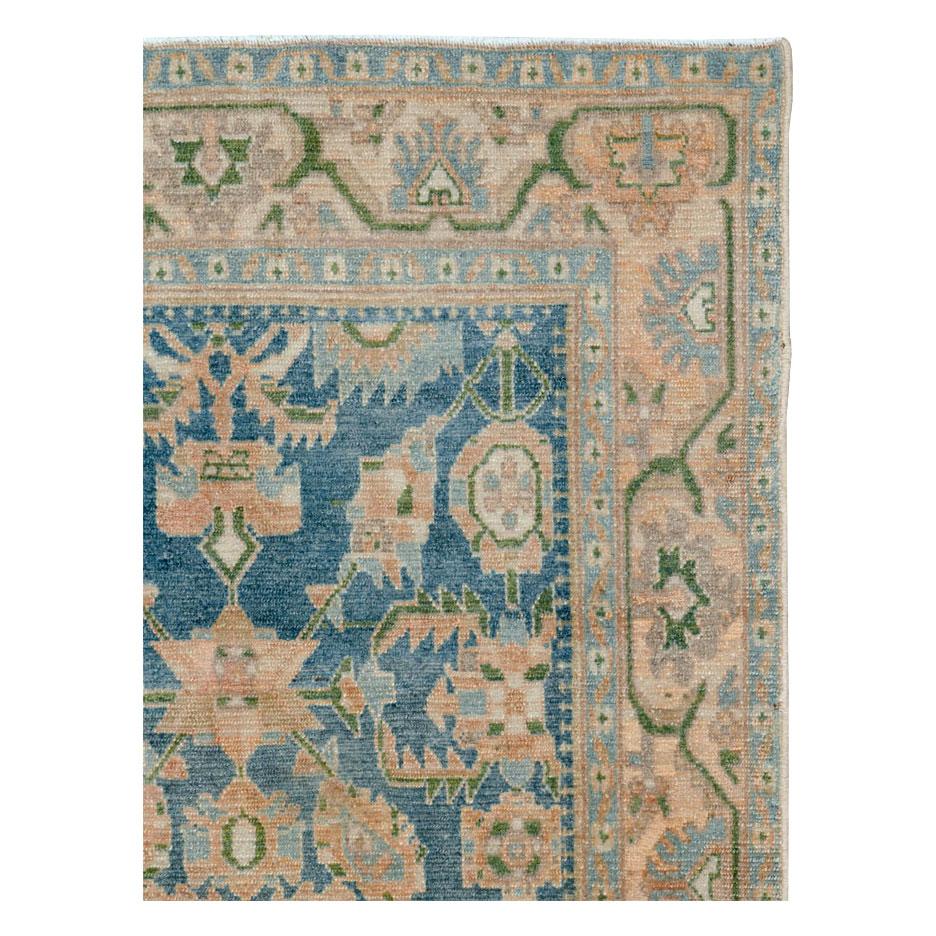 A vintage Persian Malayer accent rug handmade during the mid-20th century.

Measures: 4' 1
