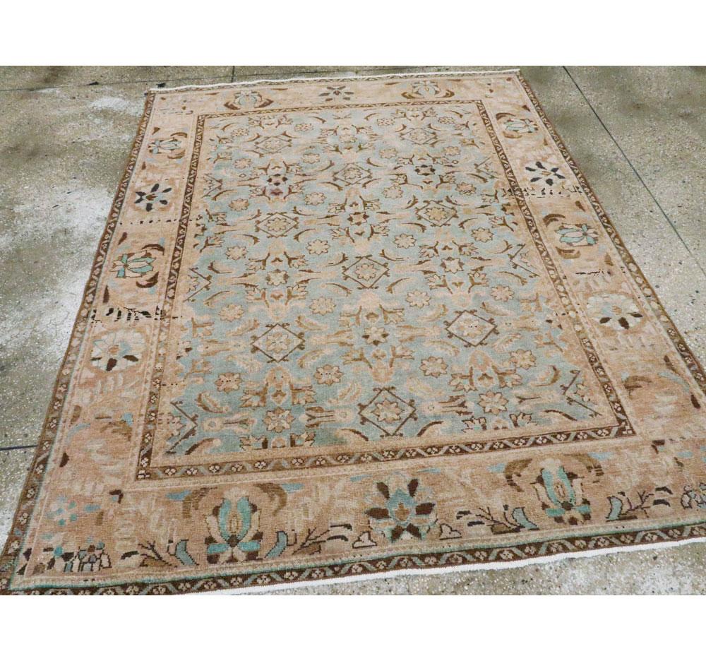 A vintage Persian Malayer accent rug handmade during the Mid-20th Century.

Measures: 5' 4