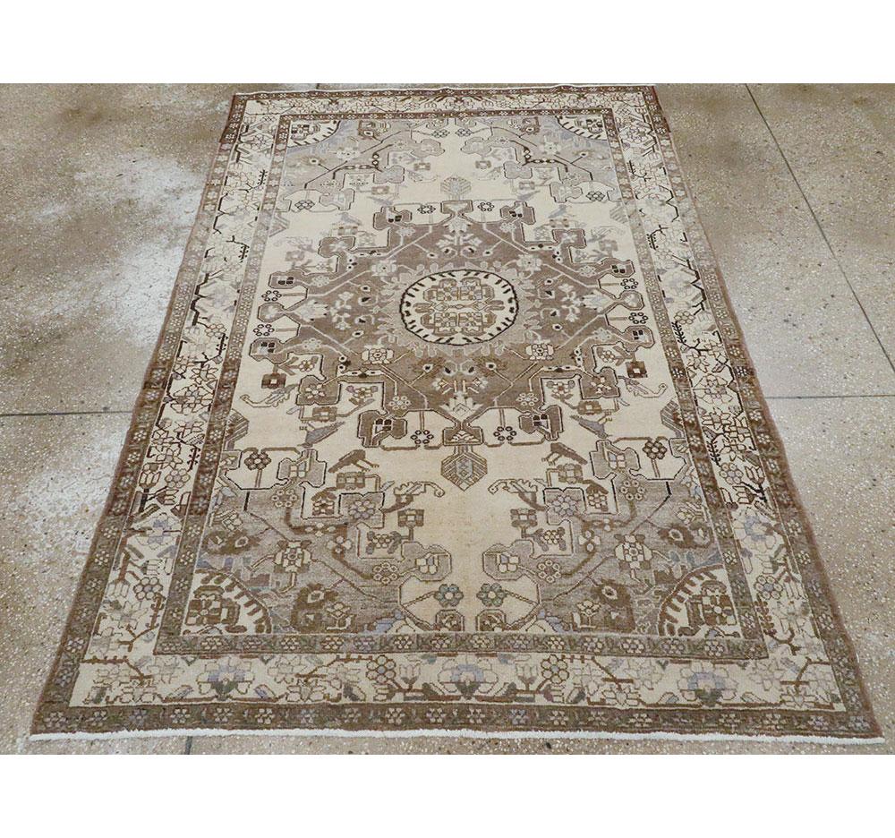 A vintage Persian Malayer accent rug handmade during the Mid-20th Century.

Measures: 4' 7