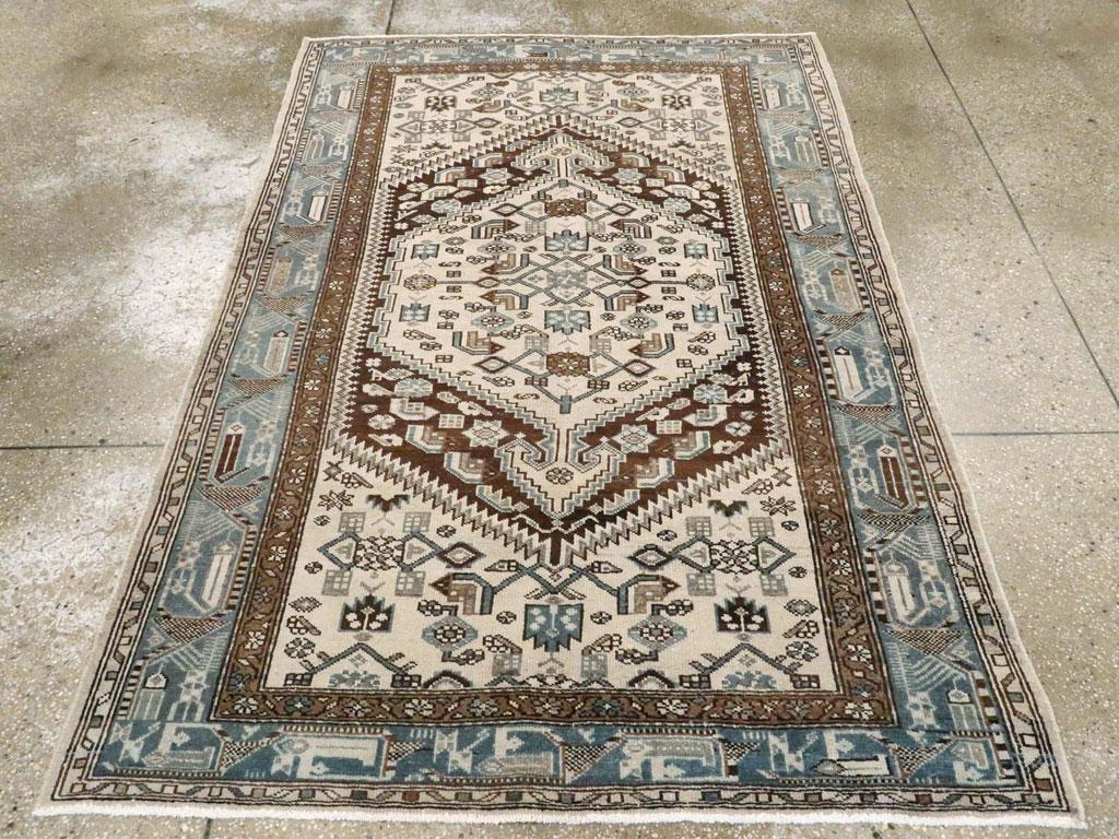 A vintage Persian Malayer accent rug handmade during the mid-20th century.

Measures: 4' 5