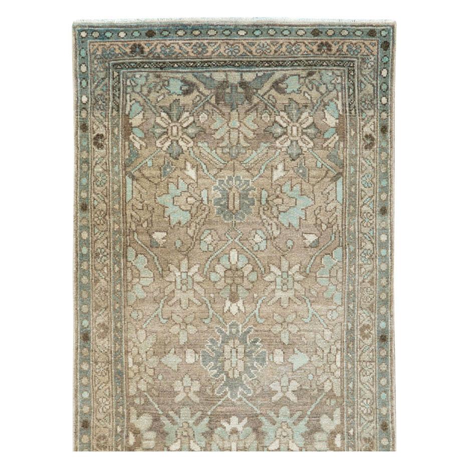 A vintage Persian Malayer rug in runner format handmade during the mid-20th century.

Measures: 2' 9