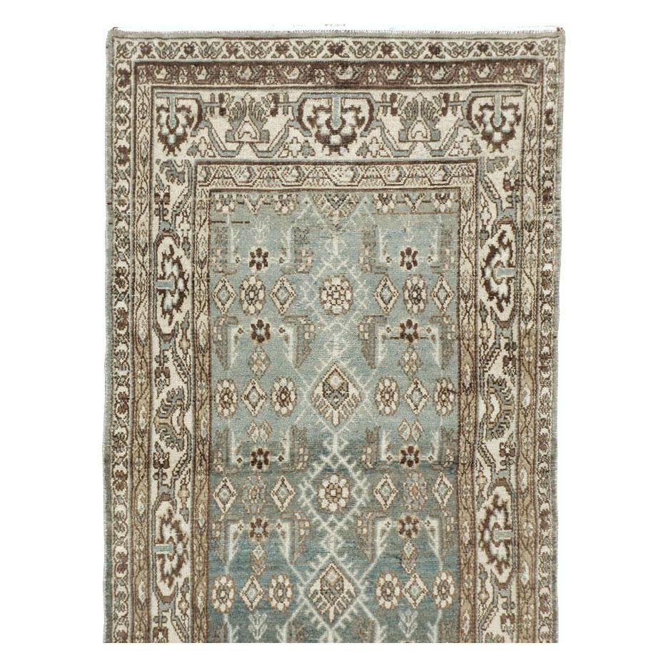 A vintage Persian Malayer rug in runner format handmade during the mid-20th century.

Measures: 3' 5