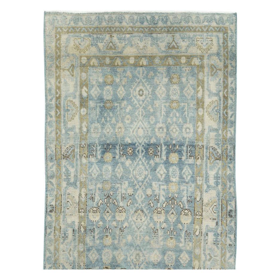 Un tapis persan vintage Malayer en format de coureur, fabriqué à la main au milieu du 20e siècle.

Mesures : 3' 5