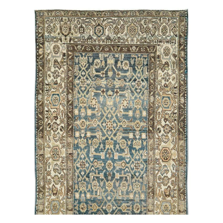 A vintage Persian Malayer rug in runner format handmade during the mid-20th century.

Measures: 3' 5