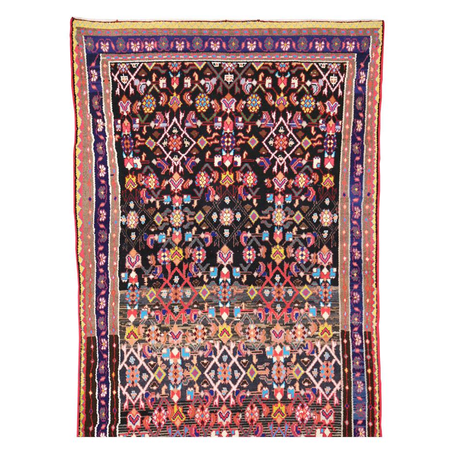 A vintage Persian Malayer rug in runner format handmade during the mid-20th century.

Measures: 3' 6