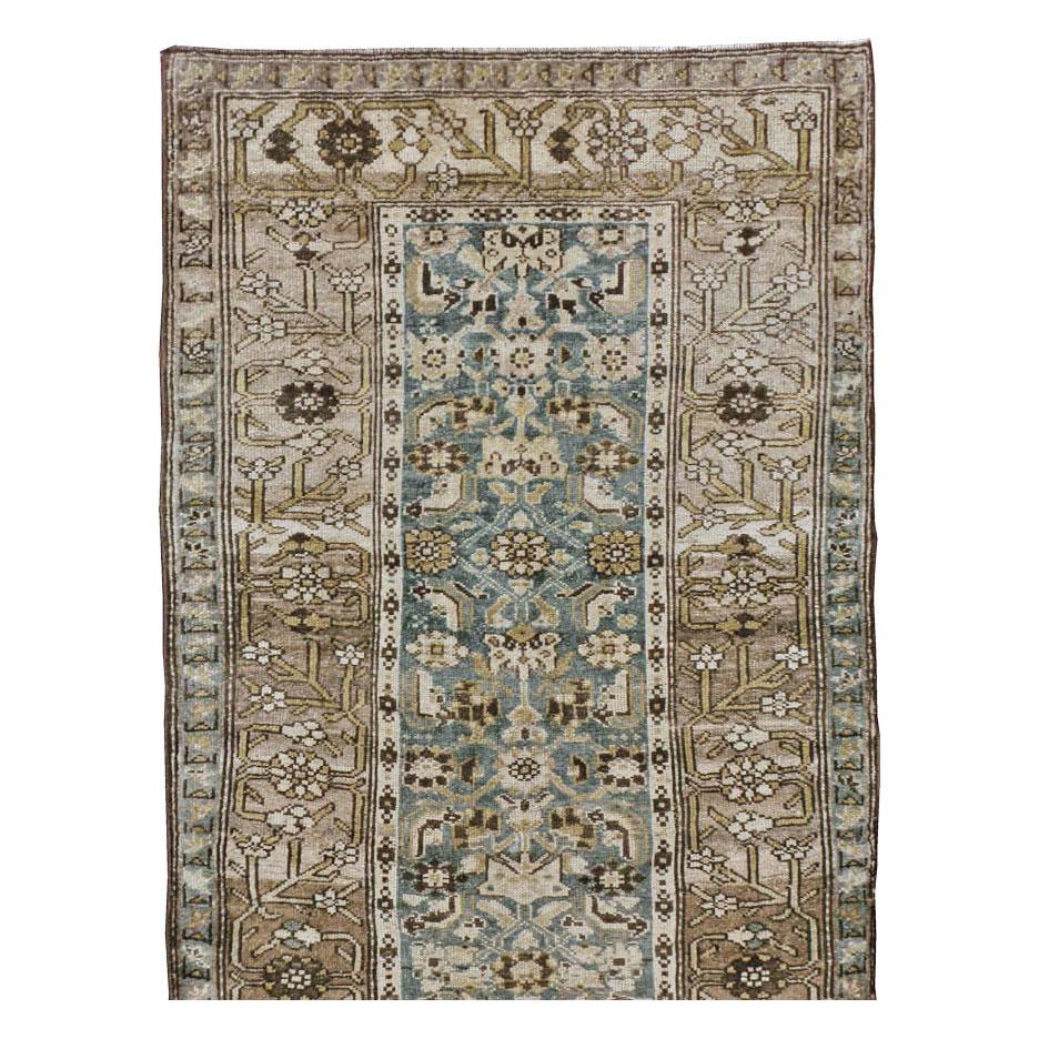 An antique Persian Malayer runner handmade during the early 20th century.

Measures: 3' 4