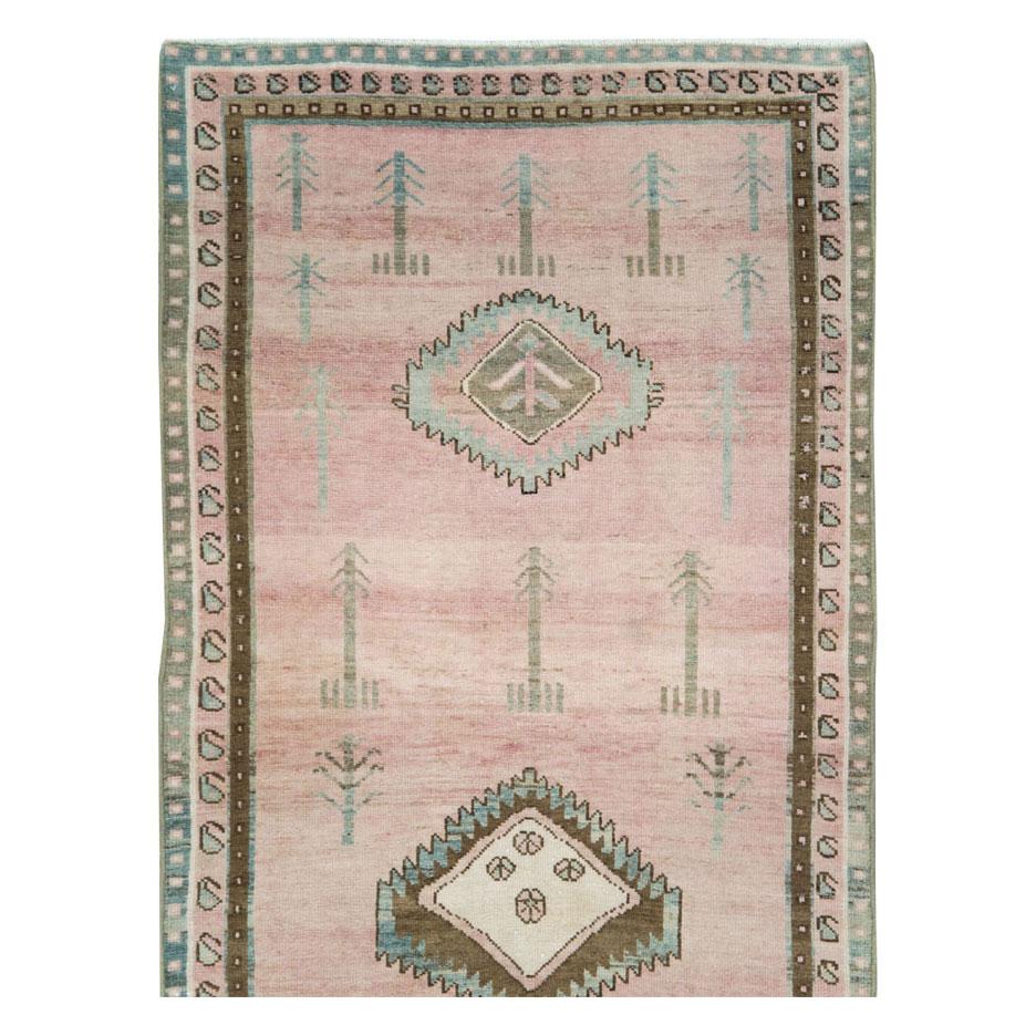 A vintage Persian Malayer runner format rug handmade during the mid-20th century in neutral blush tones and pink.

Measures: 3' 10