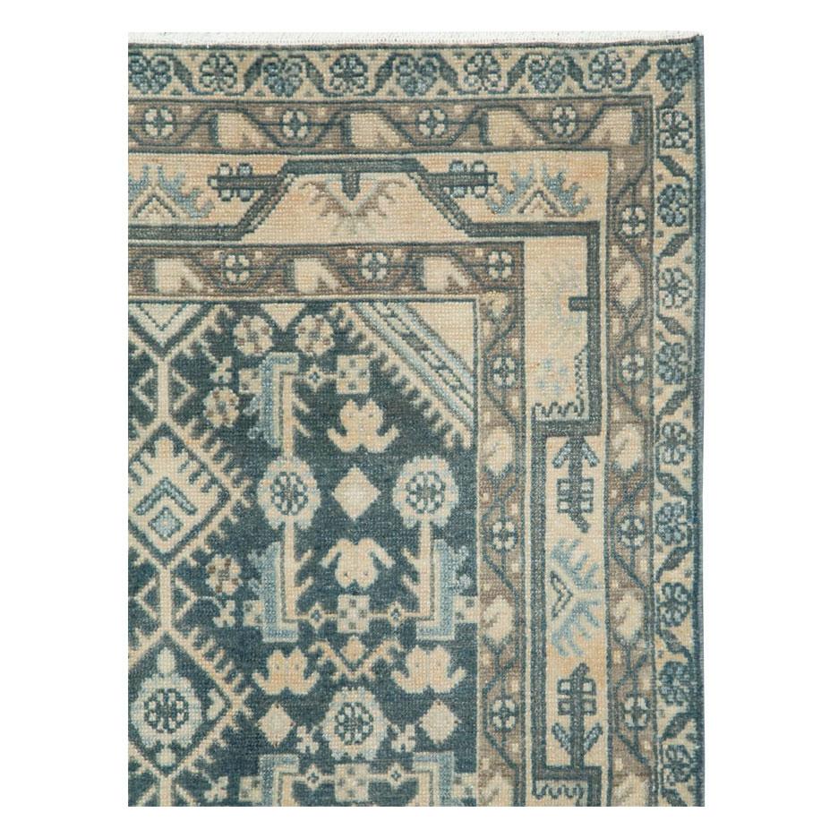 A vintage Persian Malayer throw rug handmade during the mid-20th century.

Measures: 3' 6