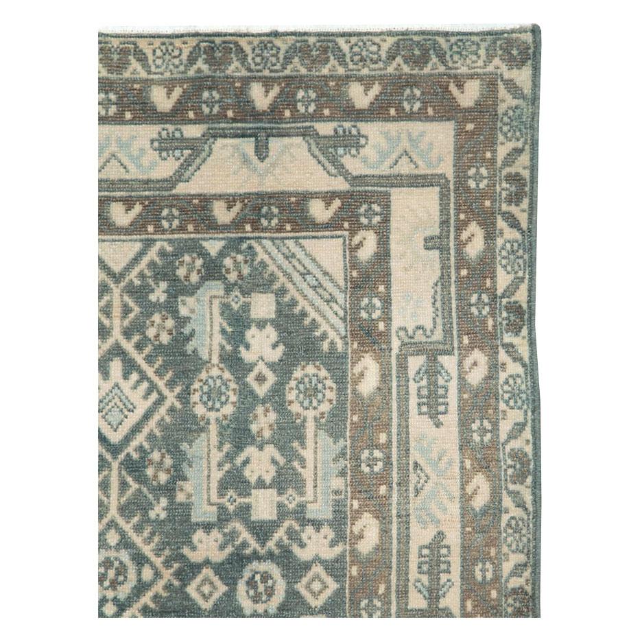 A vintage Persian Malayer throw rug handmade during the mid-20th century.

Measures: 3' 6