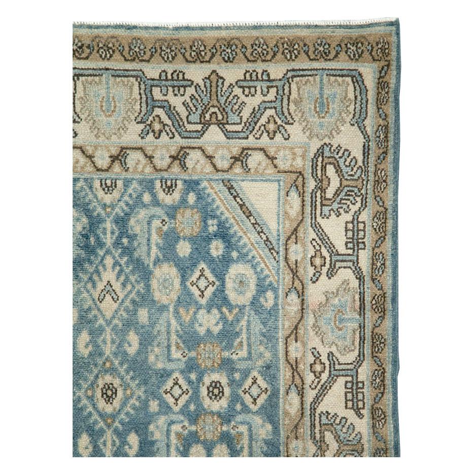 A vintage Persian Malayer throw rug handmade during the mid-20th century.

Measures: 3' 6